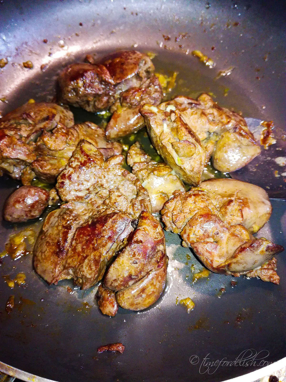 image of fried chicken livers in a pan